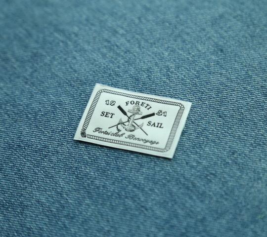 White Base Black Text Apparel Woven Label